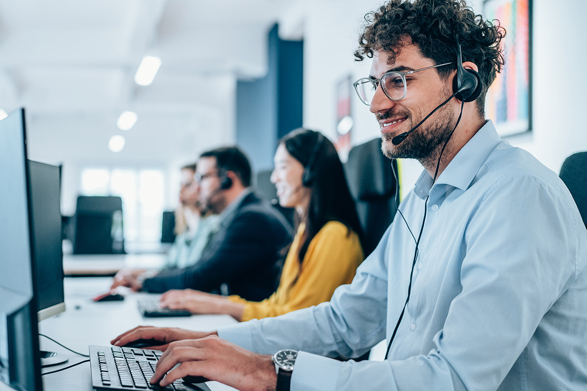 Customer enagagement specialist wearing a headset and taking a call