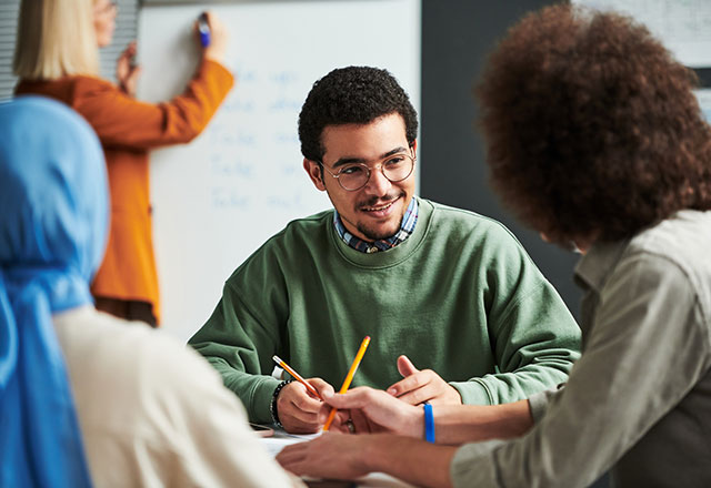 Students working together in a classroom