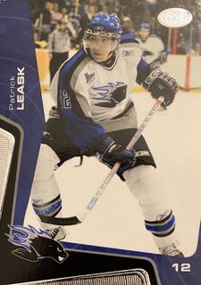 An ice hockey action shot of Patrick Leask playing for the Saint John Sea Dogs Junior Ice Hockey team.