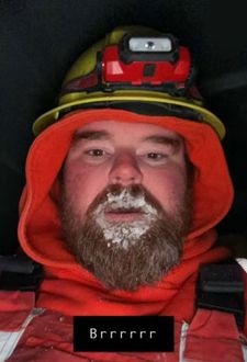 A man’s beard full of ice.