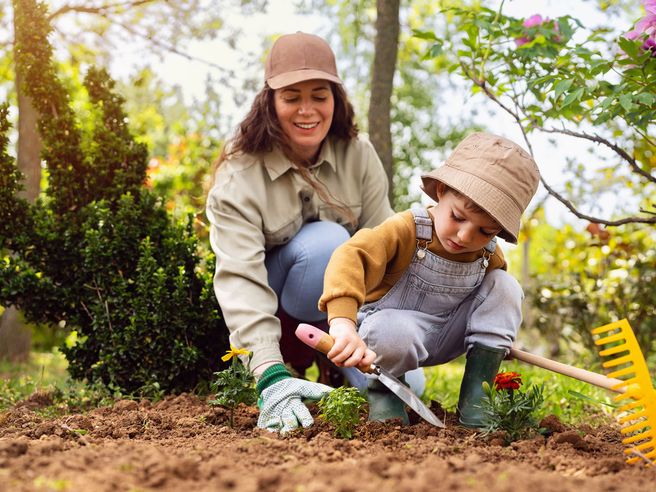 Mother and child gardening