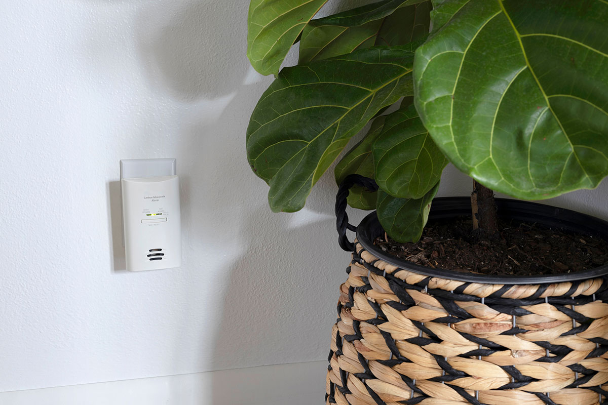 CO alarm plugged into a wall outlet